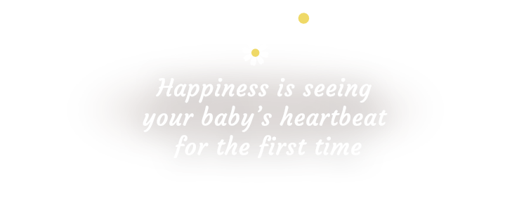 Happiness is seeing your baby's heartbeat for the first time